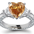 The Classic Setting has six prongs holding a round brilliant above a slender band