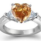 Old-world elegance characterizes Temple St. Clair Carr's gold ring with a round brilliant
