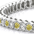 green gold, white diamonds set in white gold, canary diamonds set in yellow gold, platinum and goldsmithing