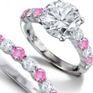 A pink and white diamond ring.
