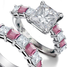 a 6.1-carat radiant-cut fancy intense pink diamond with two trapezoid white diamond side stones mounted in platinum and 18k pink gold from Harry Winston