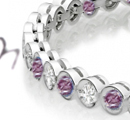 Gold chain bracelets, ornamental links with diamonds, set in platinum at spaced intervals