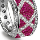 The sweet Gumdrop ring with a round brilliant by Chris Correia has a curvy band with diamond sprinkles