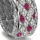 A delicious design, Michael B's ring combines a round brillant with a narrow pave-set diamond band