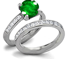 Emerald Eternity Ring with Diamonds