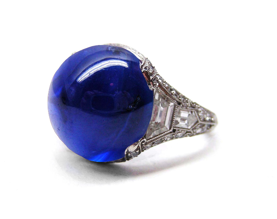 Image of Edwardian, French, Belle Epoque, Platinum, Milgrain, Filigree, Bright Blue, Luscious, Deeply Saturated, Sapphire Cabochon Ring Flanked with Trapezoid Bullet Diamonds Gallery Framework