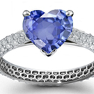 Round diamonds surround a marquise in a charming Smithwick-Dillion ring
