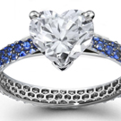 A marquise is set as a grand horizontal in a Fred Leighton pave-set diamond ring