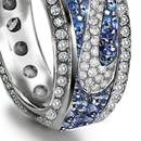 a platinum eternity band with 36 baguette-cut diamonds on his bride's left hand