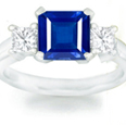 Princess Blue Sapphire Three Stone Ring with Diamonds in 14k White Gold (7X5 mm) 