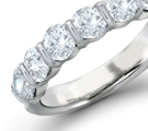 The Classic Setting has six prongs holding a round brilliant above a slender band