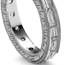 Diamond
pendant hearts, graduated border with large pear, oblong or square-shaped diamond center