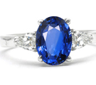 Solitaire Oval Blue Sapphire Sleek Curved Shank Ring in 14k White Gold (7x5 mm) 