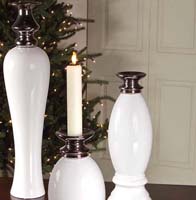 Bring a classic touch to your dining table or end table with a set of unique candles, candlesticks or candle holders. We offer the largest selection of candles and candleholders, from heirloom to modern contemporary stles & designs. Browse through our wide variety of finishes and materials like resin, metal and glass. Whether you prefer traditional, contemporary or heirllom styles,
you'll find everything you're looking for at discount prices. Shop for all your candles and more now.
