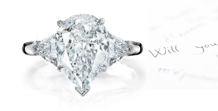 Premier Designer Three Stone Diamond Anniversary Rings
